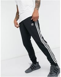 adidas Originals Three Stripe Skinny Sweatpants With Cuffed Hem in
