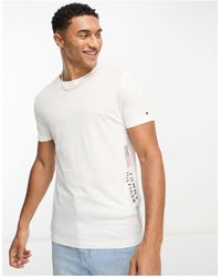 Tommy Hilfiger - Camiseta blanca con estampado lateral - Lyst