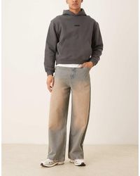 ASOS - Super Baggy Jeans Met Roodachtige Tint - Lyst