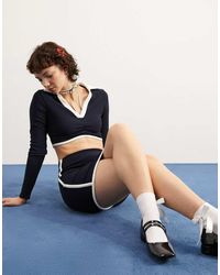 ASOS - Top Con Profilo Curvo E Colletto A Contrasto - Lyst