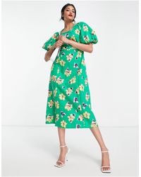 Vero Moda - Vestido midi verde con estampado floral extragrande - Lyst