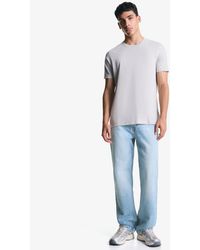 Bershka - Jeans Met Rechte Pijpen En Ruimvallende Pasvorm - Lyst