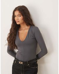 Glamorous - V-Neck Long Sleeve Bodysuit - Lyst
