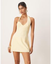 SNDY'S - Vestito Corto Svasato Effetto Lino Color Limone Allacciato Al Collo Con Dettaglio - Lyst