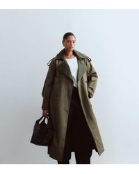ARRANGE - Curve Two Tone Lapel Double Breasted Trench Coat - Lyst