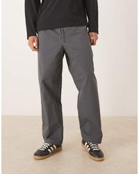 ASOS - Relaxed Tapered Trousers Charcoal Nylon - Lyst