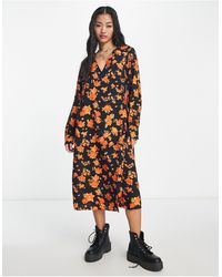 Vero Moda - Vestito midi a maniche lunghe arancione a fiori a portafoglio - Lyst