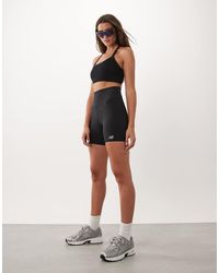 New Balance - High Rise 6 Inch Legging Shorts - Lyst