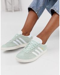 adidas Originals Superstar Slip On Trainers In White And Orange adidas Originals Superstar Slip On Trainers In White And Orange