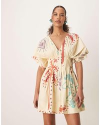 ASOS - Robe courte à manches courtes et col v avec plis serrés - imprimé abstrait - Lyst
