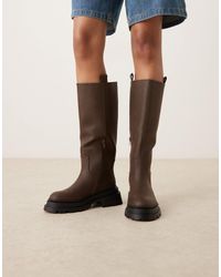 ASOS - Cecilia - bottes hautes plates à semelle chunky - chocolat - Lyst