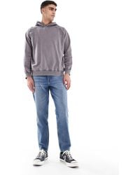 ASOS - Tapered Fit Jeans - Lyst