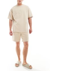 Pull&Bear - Pantaloncini color sabbia con dettaglio - Lyst