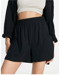 Pieces - Ribbed Runner Shorts - Lyst