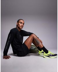 New Balance - Reflective Poly Long Sleeve Running T-Shirt - Lyst