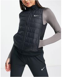 Nike Waistcoats and gilets for Women | Online Sale up to 70% off | Lyst