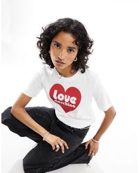 Love Moschino - T-shirt bianca con logo a cuore - Lyst