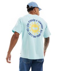 Levi's - Camiseta con estampado del logo y sol en el centro y la espalda - Lyst