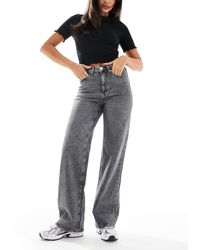 Vero Moda - Tessa - jean ample à taille haute - moyen délavé - Lyst