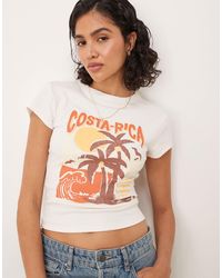 ASOS - T-shirt effet rétréci avec motif destination costa rica - crème - Lyst