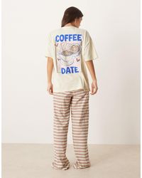 ASOS - – pyjama, bestehend aus oversize-t-shirt mit "coffee date"-grafikprint und hose mit weitem bein - Lyst