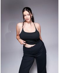 4505 - Curve – icon – kurz geschnittenes camisole-yogaoberteil mit integriertem bh - Lyst