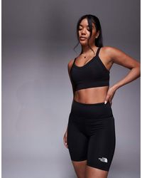 The North Face - Leggings Cortos De 8" Negros Con Logo Flex De - Lyst