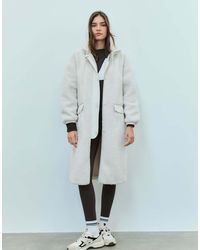 Stradivarius - Long Faux Shearling Lined Coat - Lyst