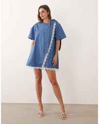 Ghospell - Denim Puff Sleeve Lace Trim Wrap Detail Mini Dress - Lyst