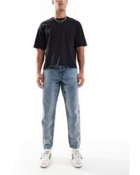 ASOS - Tapered Fit Jeans With Vintage Tint - Lyst