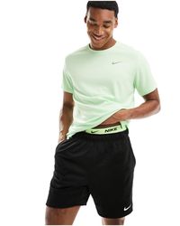 Nike - Camiseta verde dri-fit miler - Lyst