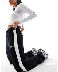 Nike - Streetwear - pantaloni cargo dritti neri - Lyst