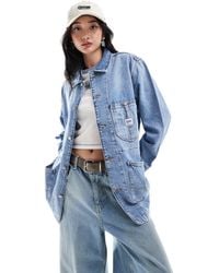 Lee Jeans - Veste en jean style workwear avec étiquette - moyen délavé - Lyst