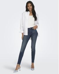 ONLY - Vaqueros Pitillo De Talle Medio En Denim Negro-Azul - Lyst