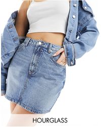 ASOS - Hourglass - mini-jupe en jean à taille haute - délavé moyen - Lyst