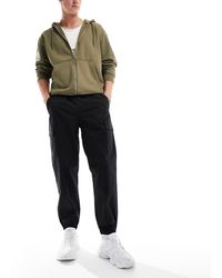 New Balance - Icon Twill Cargo Trousers - Lyst