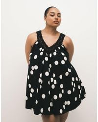 ASOS - Asos design curve - robe d'été à pois coupe babydoll courte en popeline avec col v et superposition en dentelle - noir - Lyst