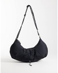 4505 - Studio Oversized Woven Cross Body Bag With Rope Detail - Lyst