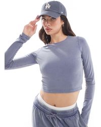 ASOS - T-shirt crop top ajusté à manches longues - indigo délavé - Lyst