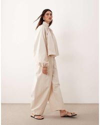 ARRANGE - Barrel Leg Pants - Lyst
