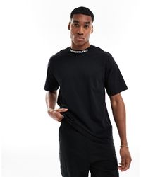 The North Face - Zumu - t-shirt nera con nastro con logo - Lyst
