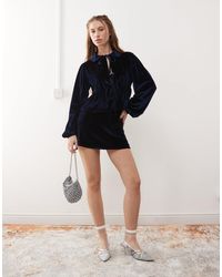 Reclaimed (vintage) - – party-minirock aus samt - Lyst