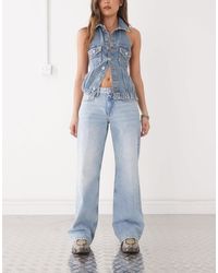 Weekday - Imoo - jean ample à taille basse - délavé - Lyst
