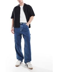 Jack & Jones - – alex – weite carpenter-jeans - Lyst