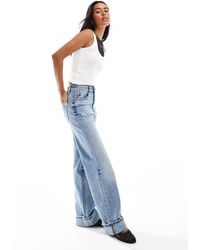 Stradivarius - – d92 – gerade geschnittene jeans aus em denim mit weitem bein - Lyst