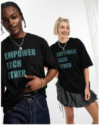 Calvin Klein - Pride - t-shirt oversize unisex nera con scritta empower - Lyst