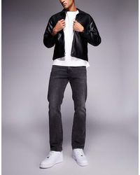 Levi's - Vaqueros Negro Lavado De Corte Tapered 502 De - Lyst