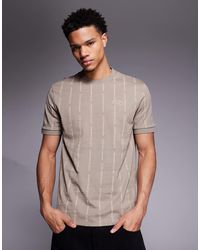 EA7 - Armani - t-shirt à monogramme sur l'ensemble - beige - Lyst