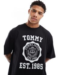 Tommy Hilfiger - T-shirt oversize nera con stampa sportiva stile college - Lyst