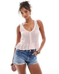 Stradivarius - Ruffle Hem Knitted Top - Lyst